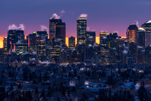 City of Calgary under Deep Freez with smoke Stacks Sunrise December 2021