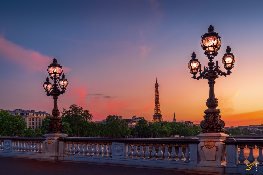 View of the Eiffel Tower from Alexander Bridge at Sunset in Paris, France, 2021.